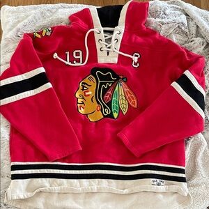 Red retired Chicago red sweater hockey jersey, #19 Toews, XXL